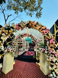 event decorators, entrance setup, hanging chandeliers, wall paneling
