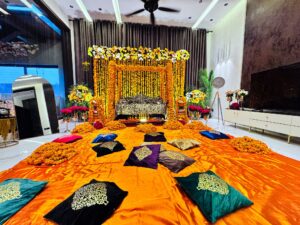 themed setup and decor, floral backdrop, mayoun decor, wedding management company