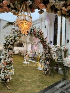 entrance decor, floral arches, hanging chandeliers, house lawn decor