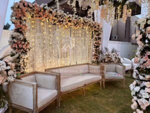 floral backdrop, neon stage, white wedding, event planners & designers