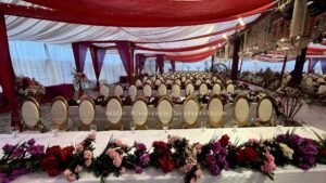 head table decor, day time event, baraat ceremony, floral decor