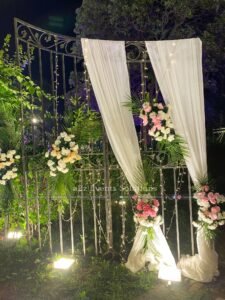 wedding management company, caterers, floral entrance, lighting decor