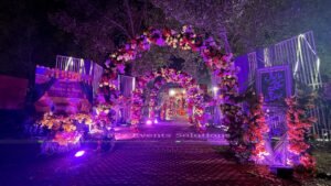 thematic entrance, floral decor, open air setup, wedding planners