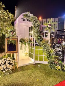 photobooth-setup event decorators, corporate event setup, photo booth corner, floral decor