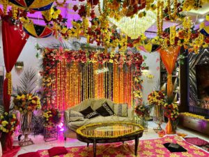 floral-backdrop backdrop, fairy lights, events management, catering