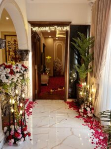 house decor, chandeliers, neon sign, baraat ceremony