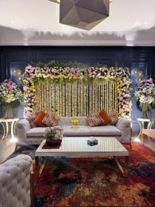 floral backdrop, nikkah stage, intimate wedding, home setup