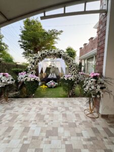 intimate ceremony, home event, floral decor, open air setup