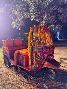 rickshaw ride, entry prop, floral decor, heritage decorations