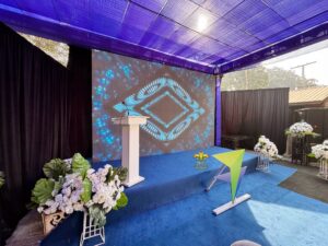corporate stage, stage backdrop, daytime event, company event