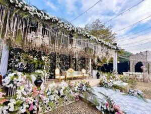 grand stage, floral backdrop, daytime walima, outdoor decor