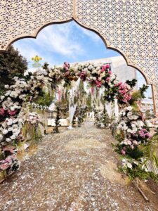 floral arches, wedding entrance, daytime wedding, walima ceremony