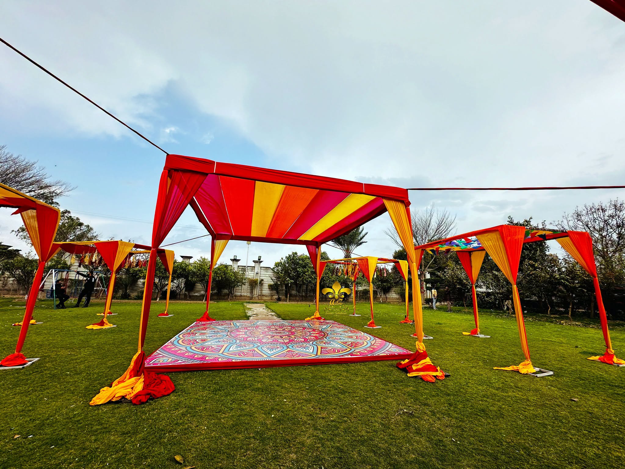open air setup, color day, intimate event, multicolored decor