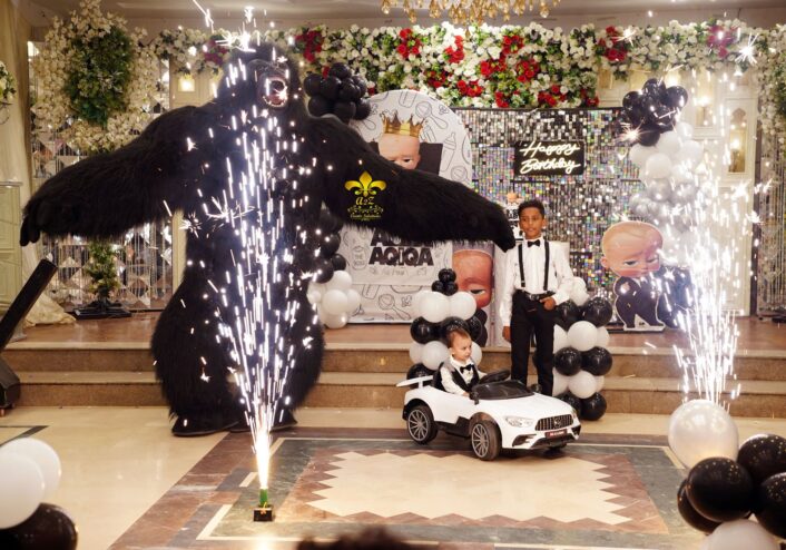 gorilla entry, cold fire, caterers, themed decor