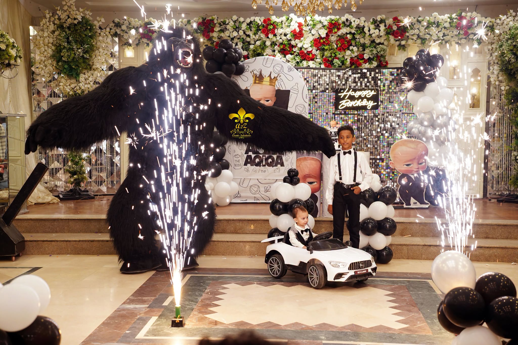 gorilla entry, cold fire, caterers, themed decor