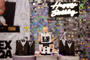 boss-baby-birthday-party-planners grand birthday setup, neon signage, thematic backdrop, indoor event