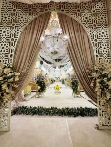 entrance decorations, walkway setup, draping, chandeliers