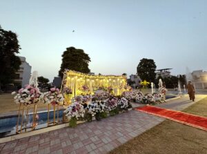 floral backdrop, outdoor setup, wedding management, a2z events