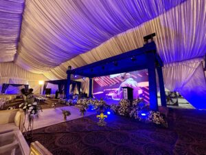 grand stage, trussing, outdoor event, carpeted walkway