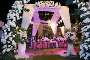 entrance setup, floral decor, western theme, fairy lights